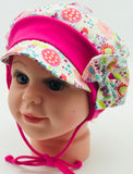 Birds and flowers cap with self fabric bow.