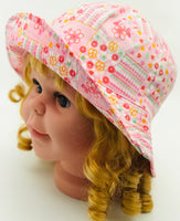 Flowers, hearts and dots prints pink hat